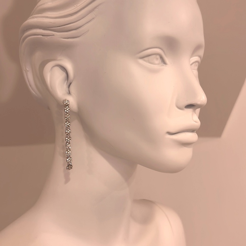 Sample pristine earrings rhodium plated and Swarovski Crystal inlay. NWT